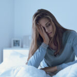 Depressed woman awake in the night