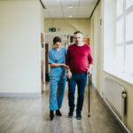 Physiatrist training a patient to walk again
